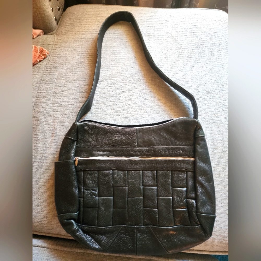 Brand new never before used genuine leather crossbody handbag